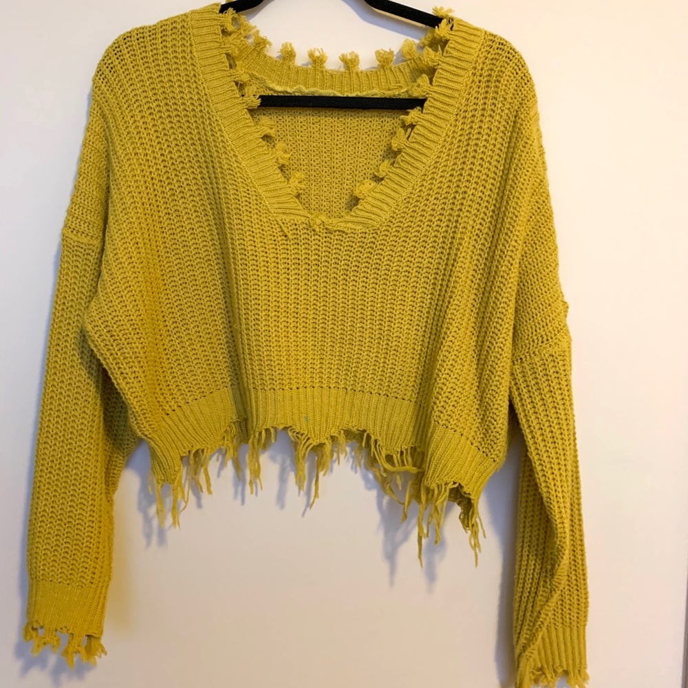 Distressed cropped sweater